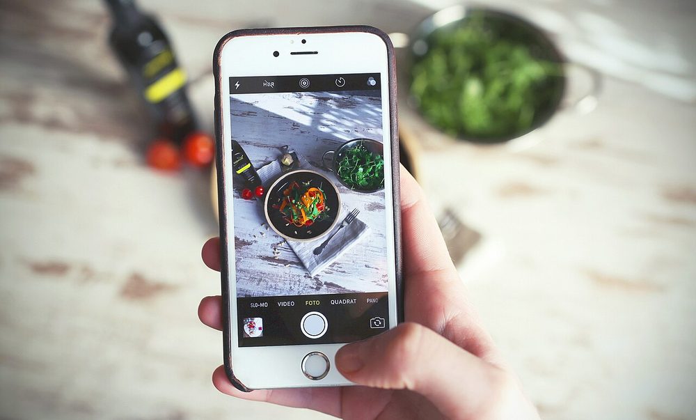 A smartphone held up to take a photo